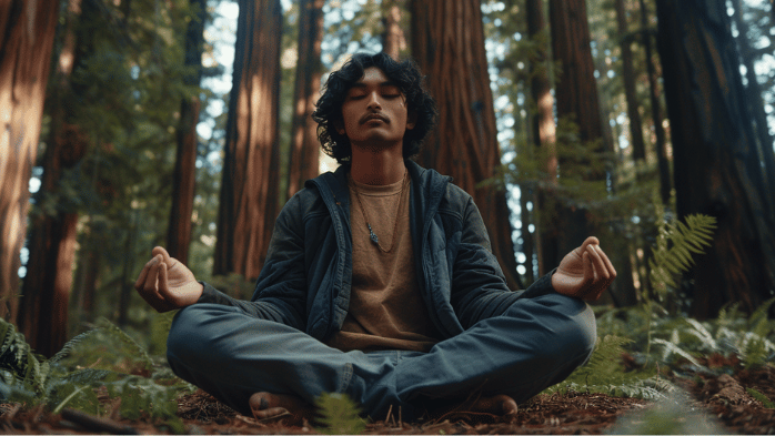 young indian man meditating and practicing self development