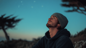 young man looking up into the sky