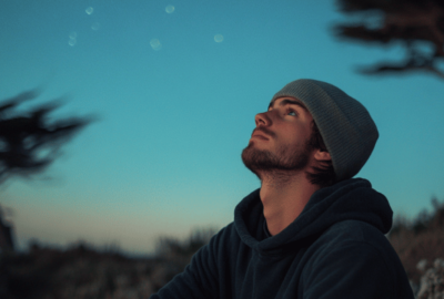 young man looking up into the sky